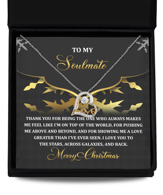 The "Soulmate-A Love - Love Dancing Necklace" comes in a gift box with a heartfelt message for your soulmate. It features 14k gold accents and Christmas wishes, making it the perfect symbol of love and celebration.