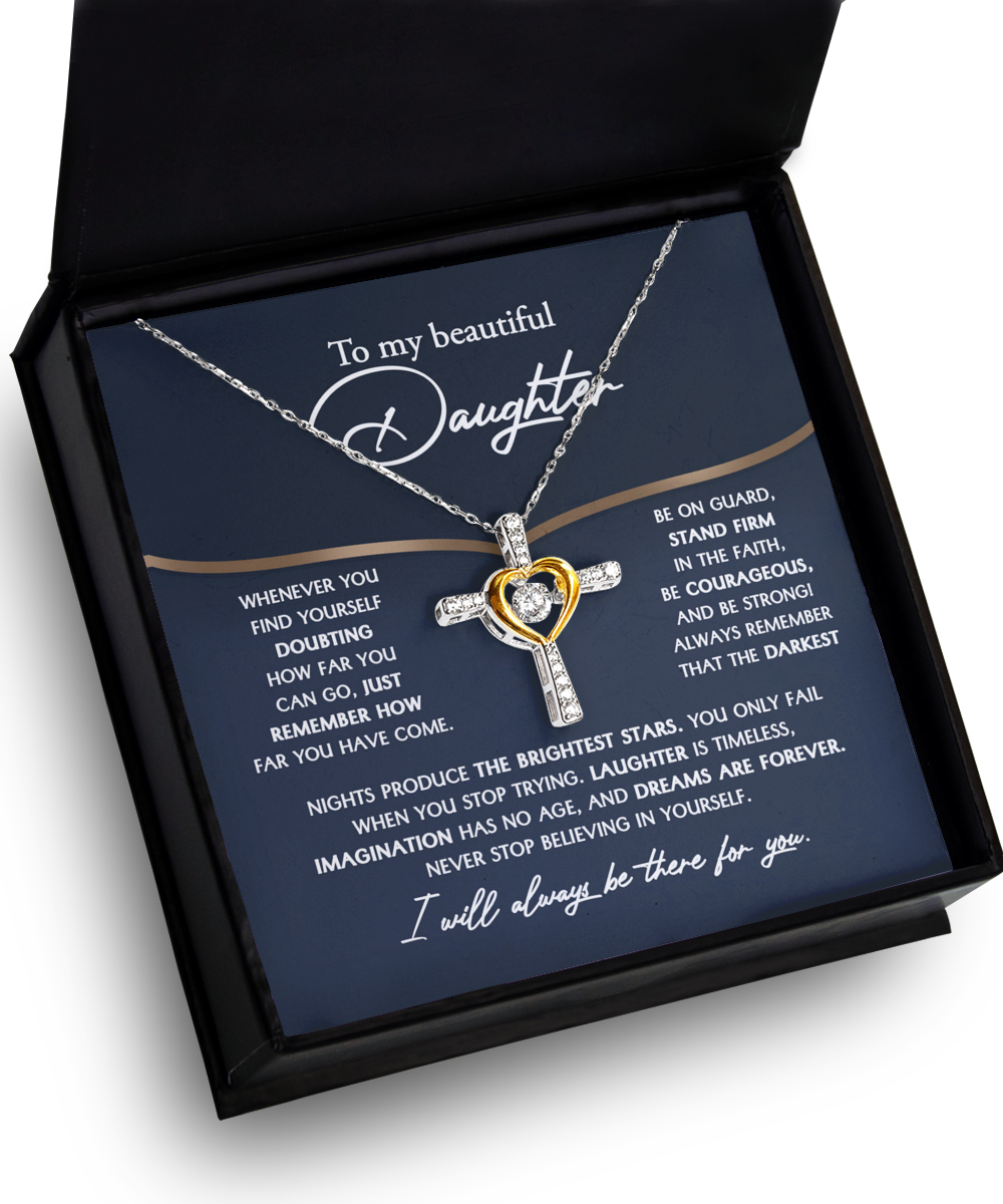 To Daughter-Brightest Stars - Cross Dancing Necklace: A sterling silver necklace featuring a heart pendant, elegantly presented on a rhodium-plated blue card with an inspirational message addressed to 'my beautiful daughter,' all inside a sophisticated black box.