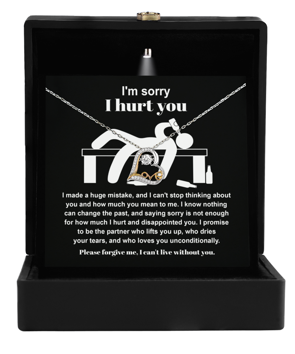 A Sorry-Change The Past 2 - Love Dancing Necklace, crafted in 14k gold and presented in a gift box, comes with a heartfelt apology message that reads, "I'm sorry I hurt you," along with a promise to be a supportive partner.