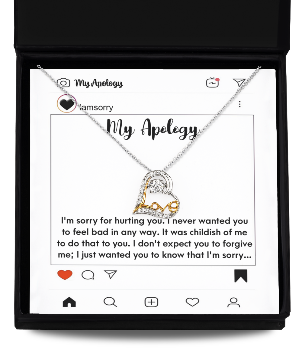 A Sorry-My Apology - Love Dancing Necklace, featuring a silver and gold .925 Sterling Silver pendant, is beautifully set on an Instagram-themed card with a heartfelt apology message. The entire presentation comes in a black gift box with "My Apology" elegantly inscribed on the card.