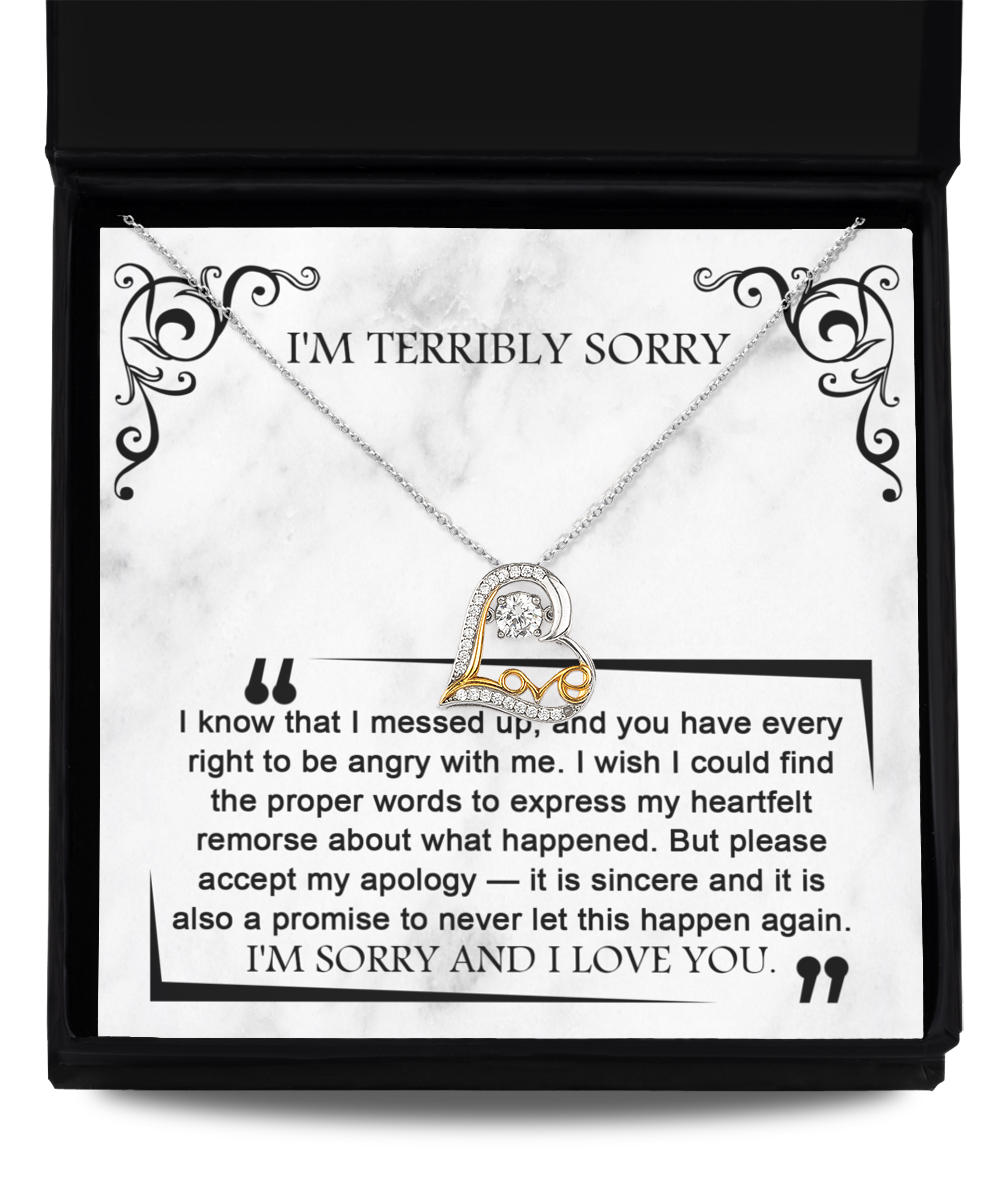 The Sorry-Angry With Me - Love Dancing Necklace is elegantly displayed in a box with a heartfelt note apologizing and expressing love, crafted from .925 Sterling Silver, set against a decorative background that reads "I'M TERRIBLY SORRY.