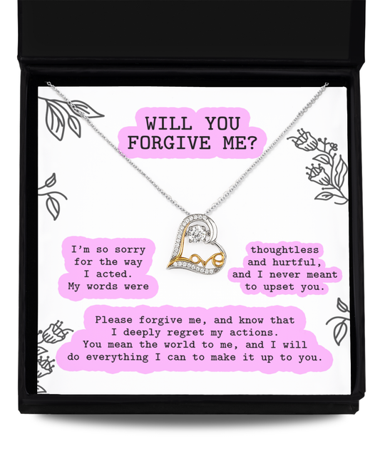 The "Sorry-Never Meant To - Love Dancing Necklace," a sterling silver necklace with a heart pendant, comes in a jewelry box and includes a printed note with an apology message asking for forgiveness.