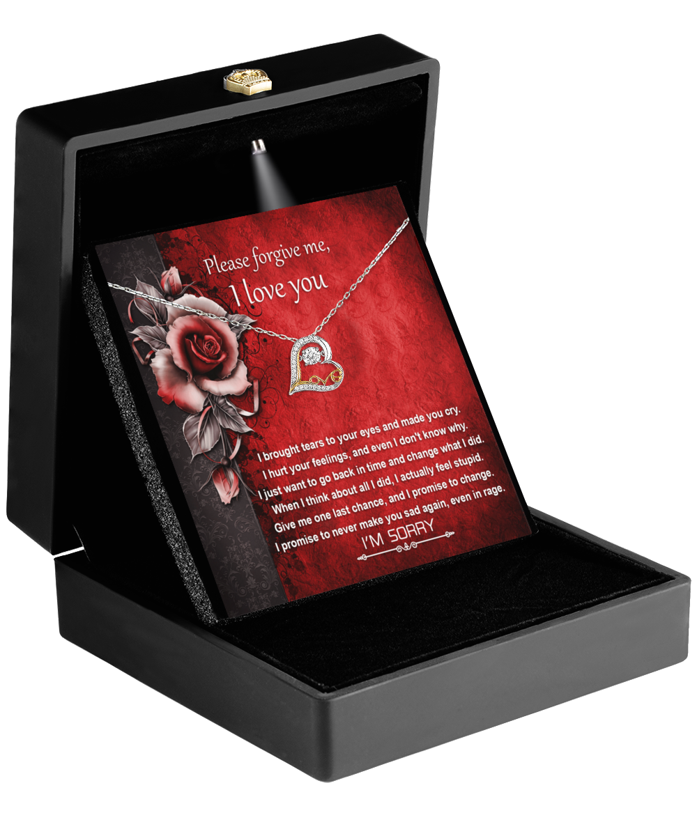 In the open black box, the Sorry-One Last Chance - Love Dancing Necklace with its 14k gold heart-shaped pendant lies beside a heartfelt apology message card saying "I love you.