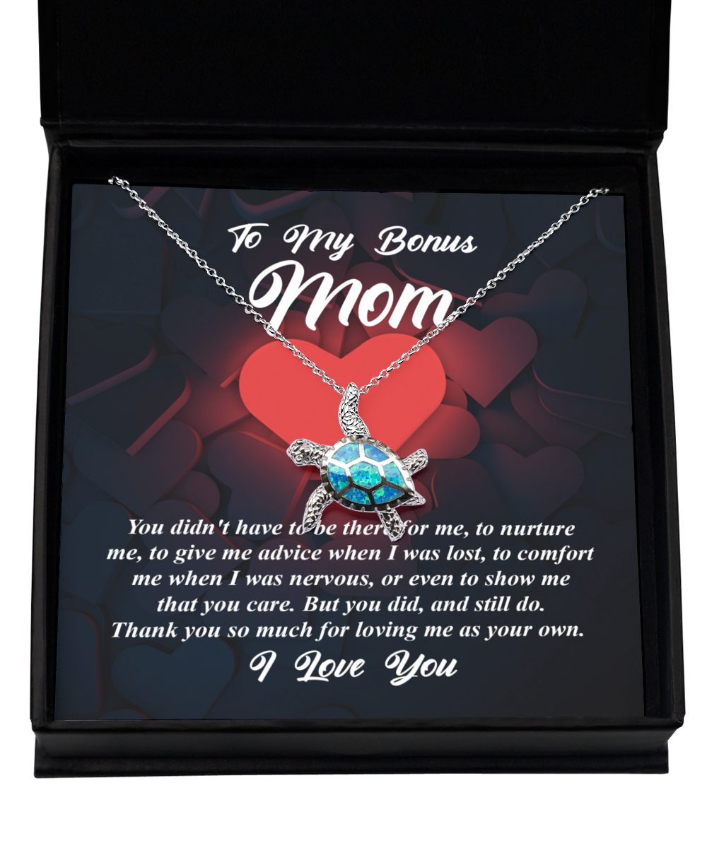 A To Bonus Mom, That You Care - Opal Turtle Necklace from Gearbubble, featuring a heartfelt message in a gift box, symbolizing a Bonus Mom Gift.
