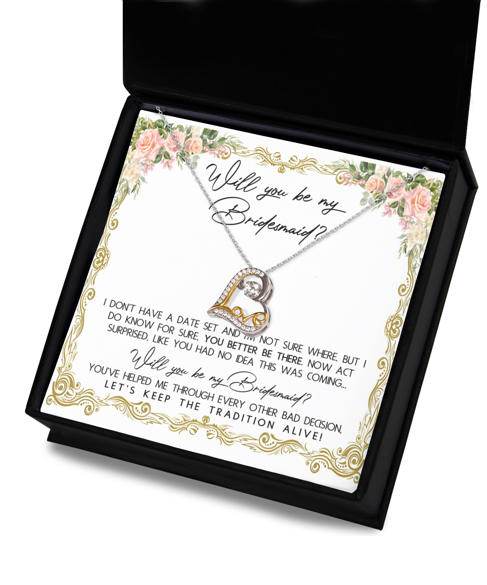 Elegant Bridesmaid-Keep The Tradition - Love Dancing Necklace with a heart pendant set against a floral card with the message, "Will you be my Bridesmaid?" in decorative text. The card humorously asks the recipient to join in on your special day.