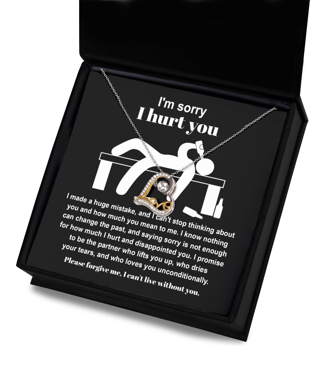 The Sorry-Change The Past 2 - Love Dancing Necklace with a heartfelt message reads: "I'm sorry I hurt you. I made a huge mistake. Please forgive me, I can't live without you." The sterling silver necklace features a pendant of a figure holding a heart.