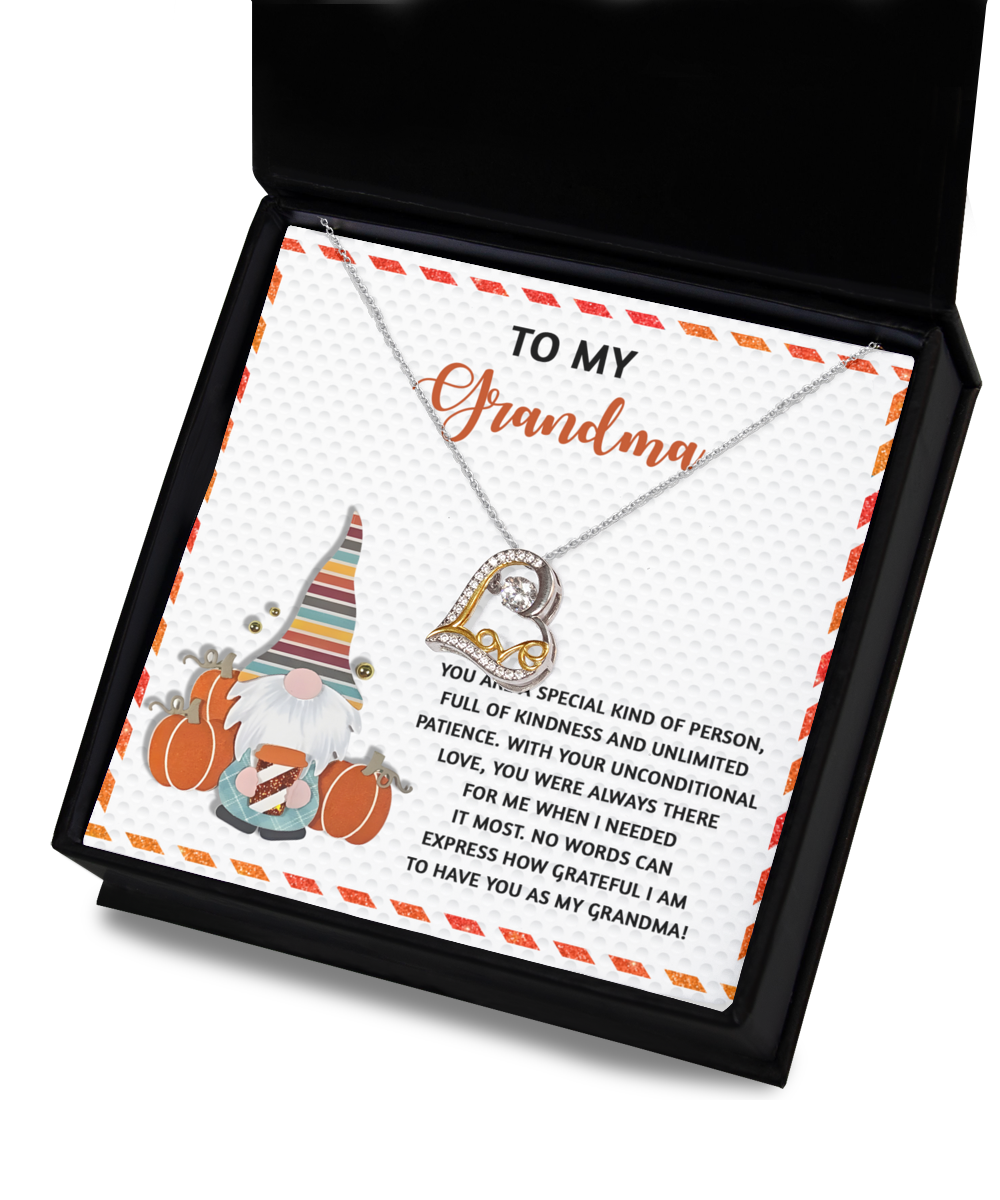 The Grandma-Needed It Most - Love Dancing Necklace is crafted from sterling silver and comes in a gift box with a heartfelt message for Grandma, showcasing a delightful design with pumpkins and a gnome.