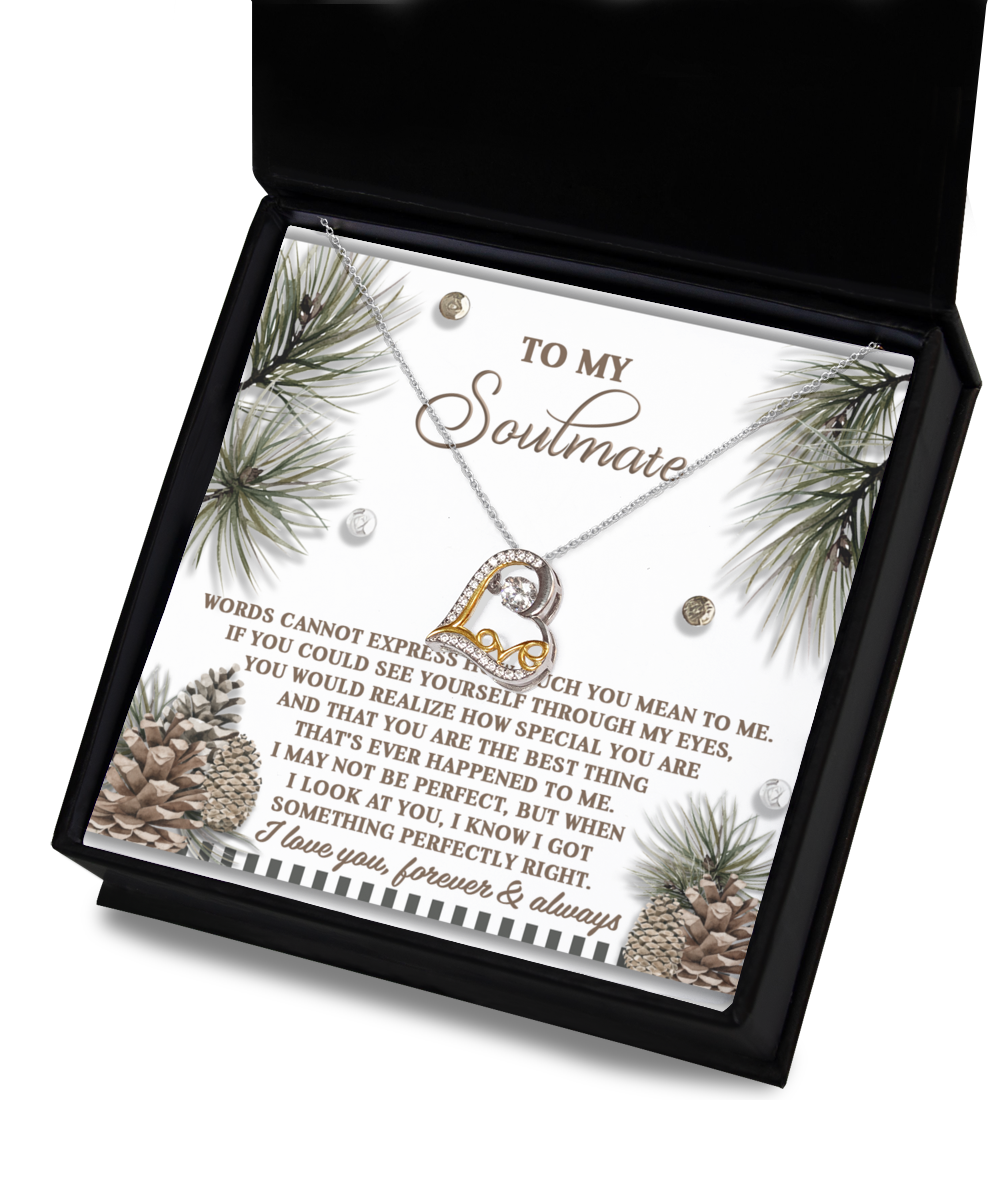 Open the box to reveal a Soulmate-Perfectly Right - Love Dancing Necklace, showcasing a heart pendant beautifully crafted in sterling silver. The inside lid carries a sentimental message addressed to "My Soulmate," adorned with designs of pinecones and greenery.