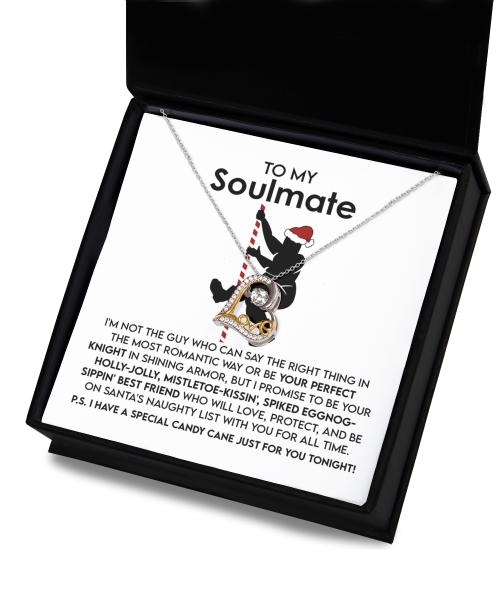 A Soulmate-For All Time - Love Dancing Necklace, crafted in sterling silver with a pendant resembling the Eiffel Tower, is beautifully showcased in a gift box. Inside, a playful message for a soulmate is included alongside a delightful cartoon Santa, bringing warmth and charm to the presentation.