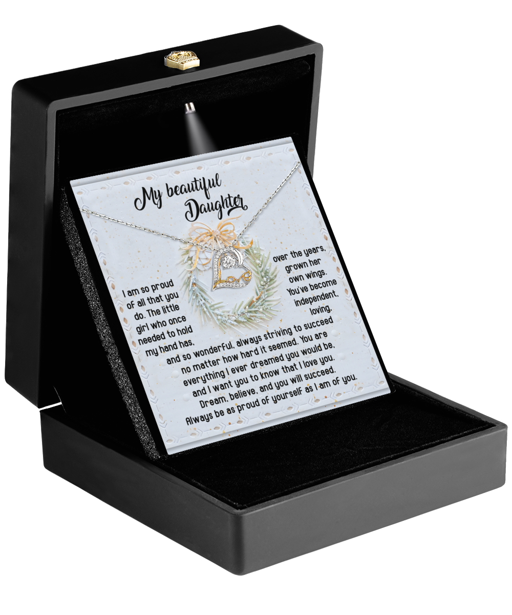 The black jewelry box opens to reveal the "Daughter-Proud Of Yourself - Love Dancing Necklace," a heart-shaped piece crafted in 14k gold, accompanied by a heartfelt message card titled "My Beautiful Daughter.