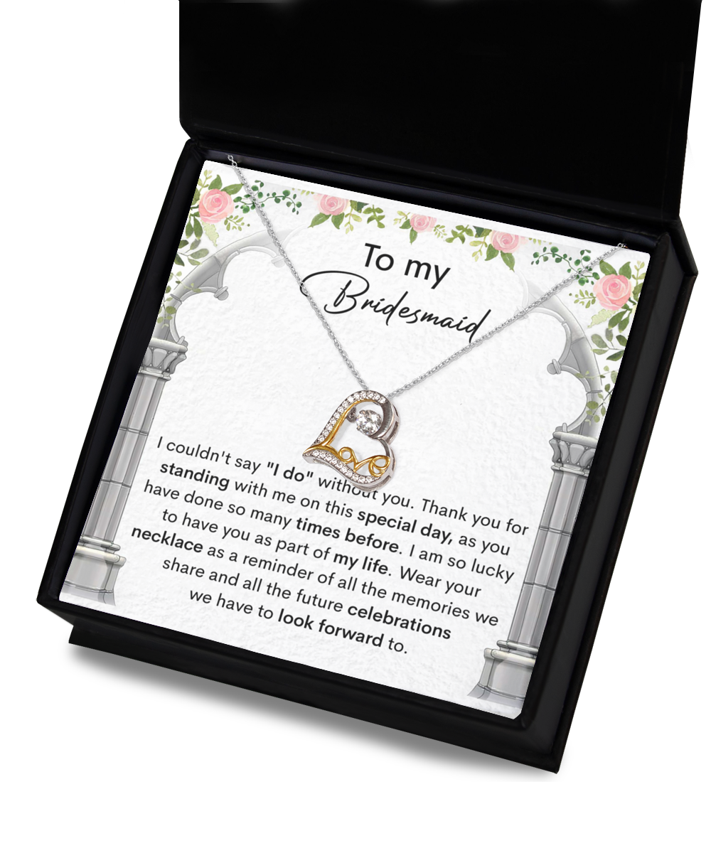 A bridesmaid thank you card adorned with floral designs, featuring the Bridesmaid-Standing With Me - Love Dancing Necklace. The card expresses gratitude for the bridesmaid's support and looks forward to future celebrations.