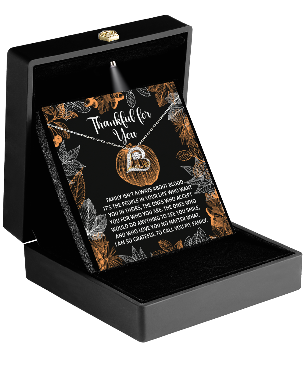 An open black gift box showcases the stunning Thanksgiving-To Call You - Love Dancing Necklace on a card featuring leaf designs and a heartfelt "Thankful for You" message, all beautifully crafted in sterling silver.