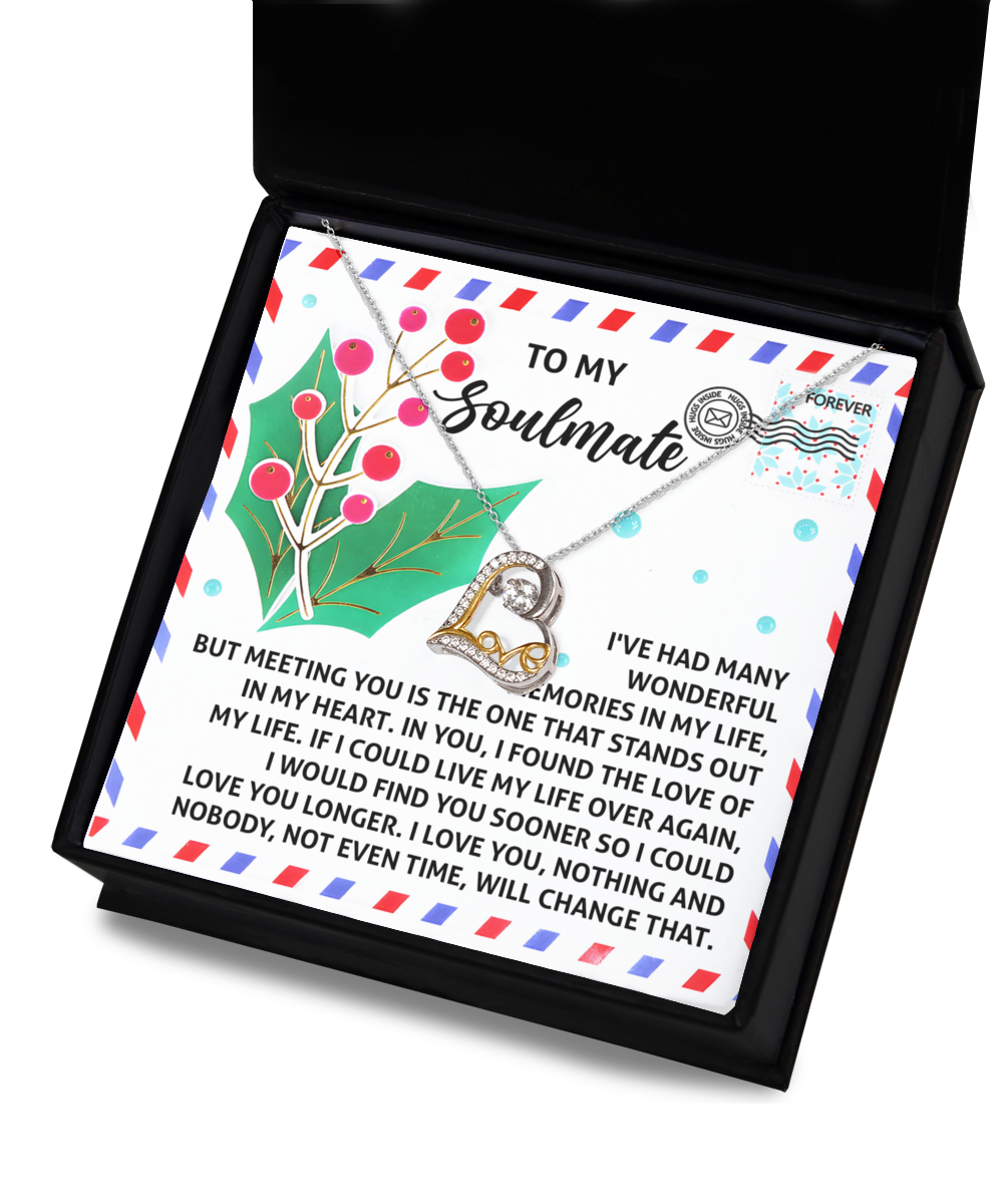 A Soulmate-Love You Longer - Love Dancing Necklace with a "To My Soulmate" card showcasing an emotional message is elegantly presented in an open gift box. The card is adorned with berries and a "Forever" stamp design, and the necklace dazzles brilliantly in 14k gold.