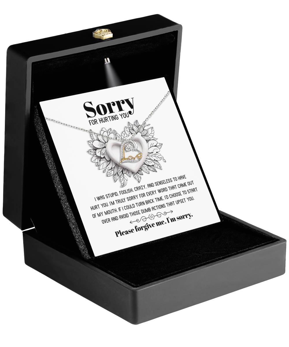 The Sorry-Turn Back Time - Love Dancing Necklace, delicately placed in a black box and accompanied by a heartfelt note that reads, "Sorry for hurting you. Please forgive me. I'm sorry," is the perfect gift to express genuine regret and rekindle the warmth of an unspoken bond.