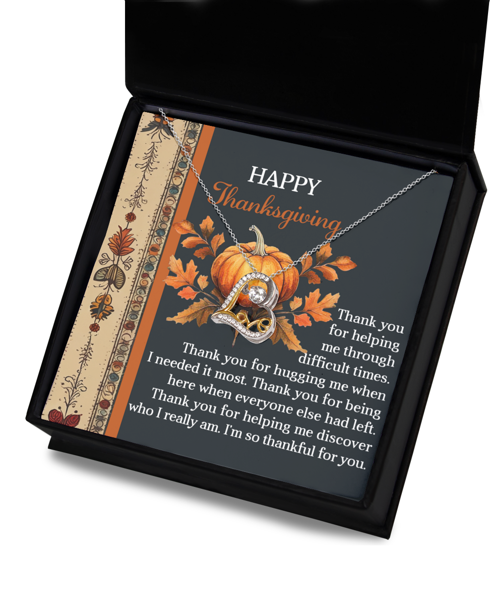 The "Thanksgiving-I Really Am - Love Dancing Necklace," crafted in sterling silver and featuring a "Love" pendant, is elegantly packaged in a box adorned with a Thanksgiving message and an autumn-themed design.