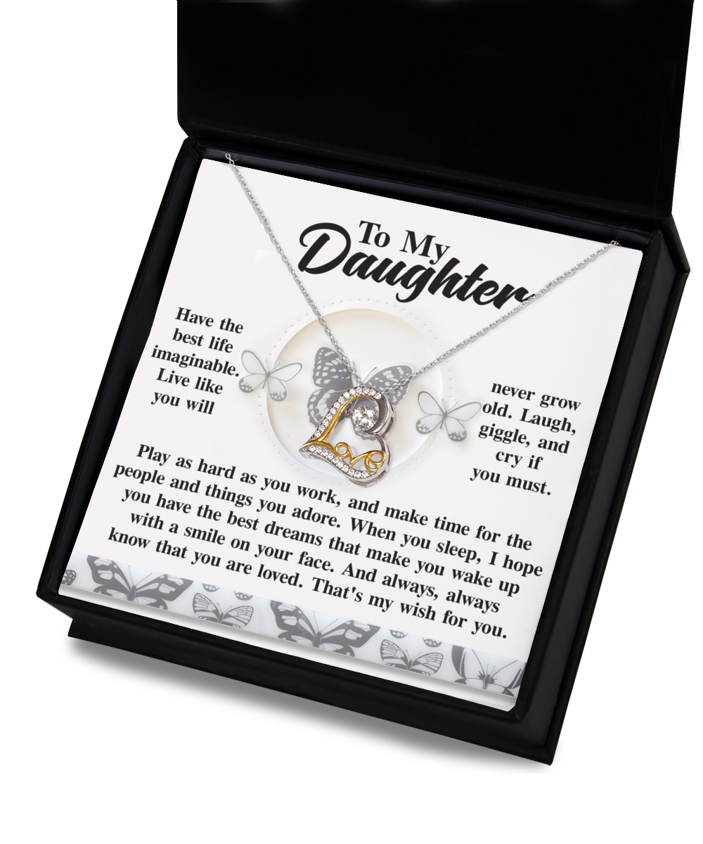 The Daughter-My Wish - Love Dancing Necklace, crafted in sterling silver with a heart and wings pendant, is beautifully packaged in a gift box. Inside, you'll find a touching message for a daughter, making this necklace an unforgettable expression of love.