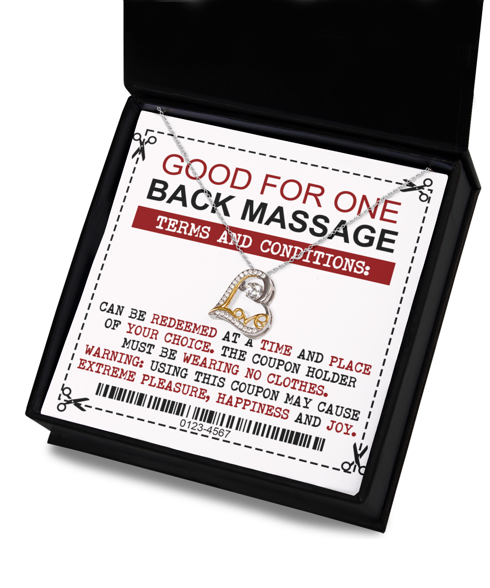 A coupon encased in a black box offers one Wife-Back Massage with specific terms, including the need for the coupon holder to be without clothes and noting the potential for extreme pleasure and joy. Perfectly pairs with our Love Dancing Necklace.