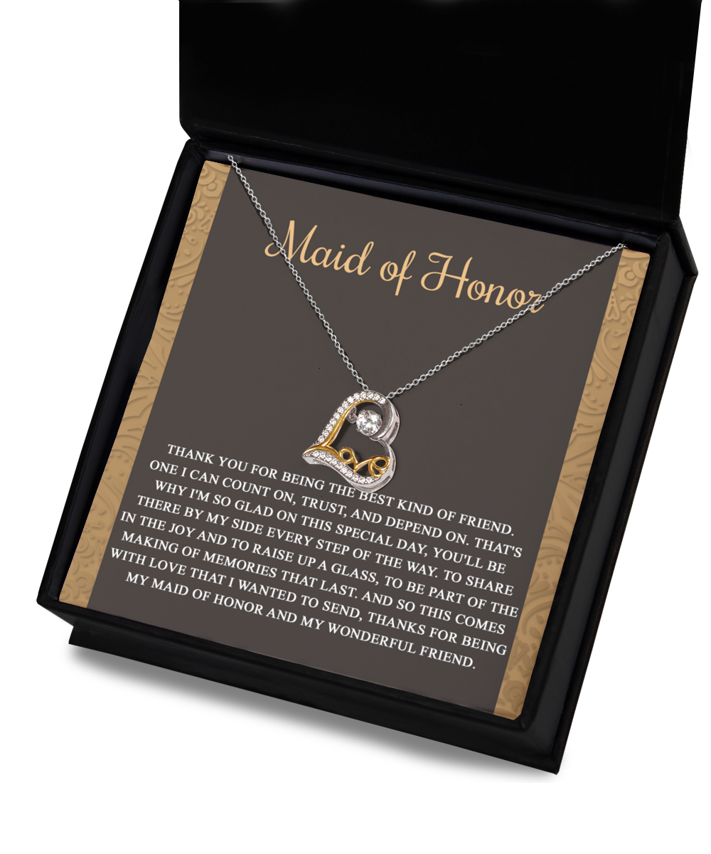 A stunning Sterling Silver "To Maid of Honor-Kind Of Friend - Love Dancing Necklace" displayed in a box with a heartfelt message. The message, titled "Maid of Honor," expresses gratitude for the friendship, support, and memories shared with the maid of honor.