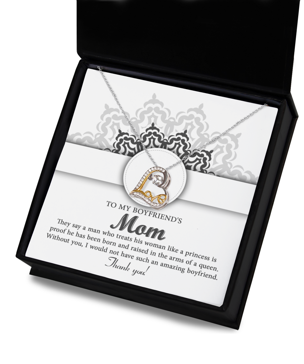 The "To Boyfriend's Mom, In The Arms - Love Dancing Necklace" is the perfect gift, elegantly presented in a beautiful box with a heartfelt card for your boyfriend's mom.