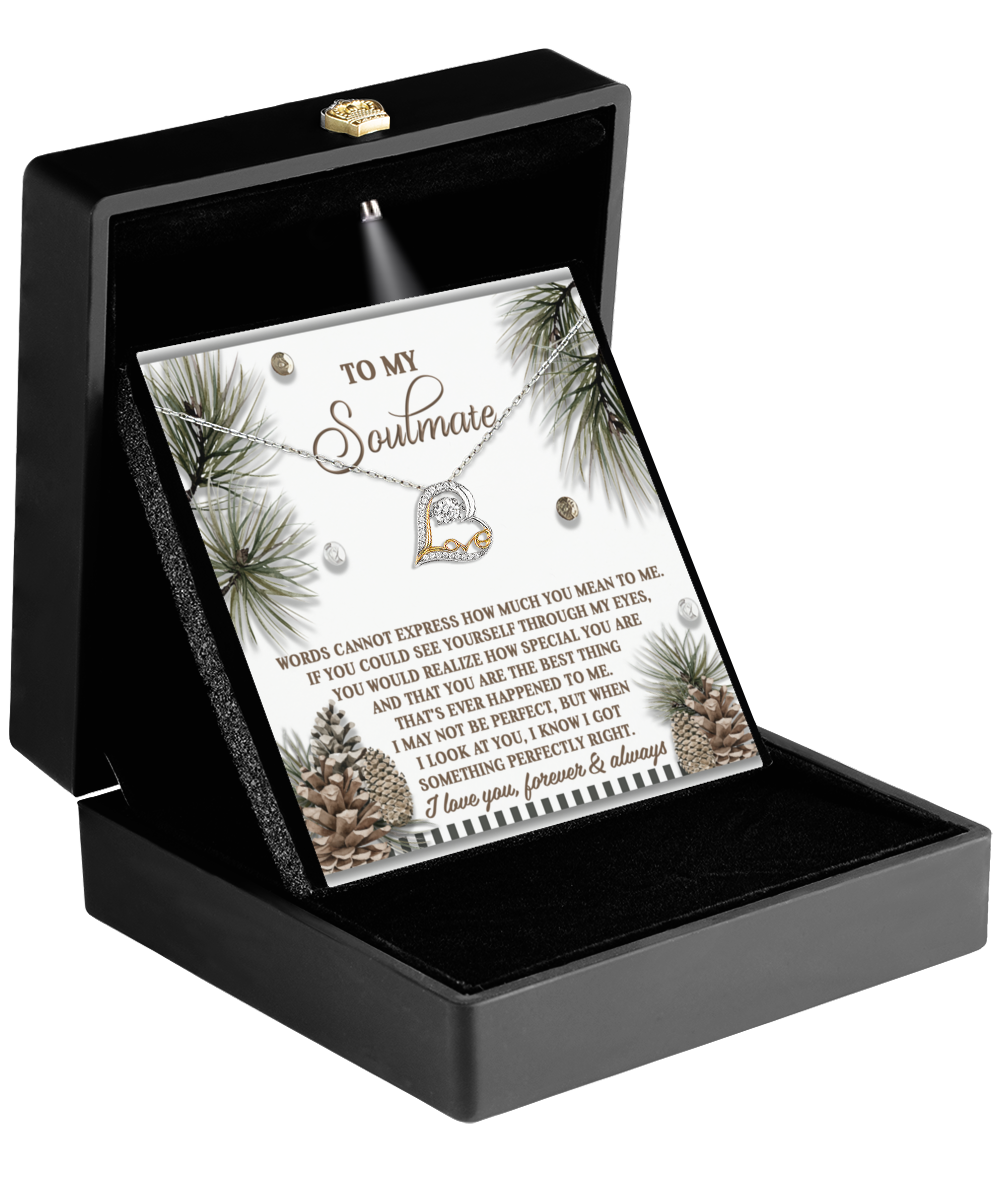 Reveal the Soulmate-Perfectly Right - Love Dancing Necklace in a black jewelry box, accompanied by a heartfelt message that says "To My Soulmate" and adorned with decorative pinecone and branch illustrations.