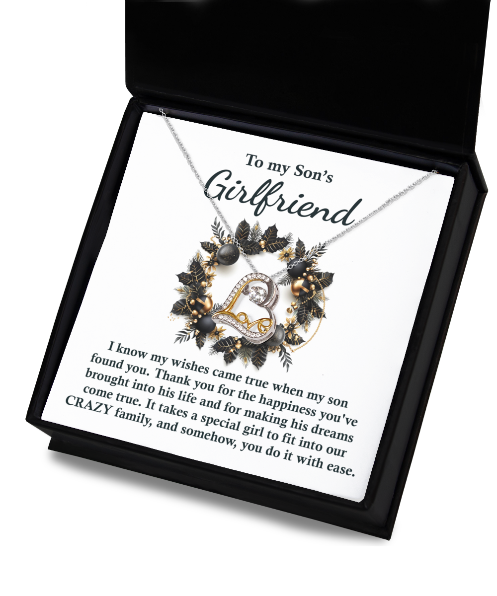 Product Description: The "Son's Girlfriend - Found You - Love Dancing Necklace" is a sterling silver necklace presented in a gift box, showcasing a heartfelt message dedicated to a son's girlfriend.