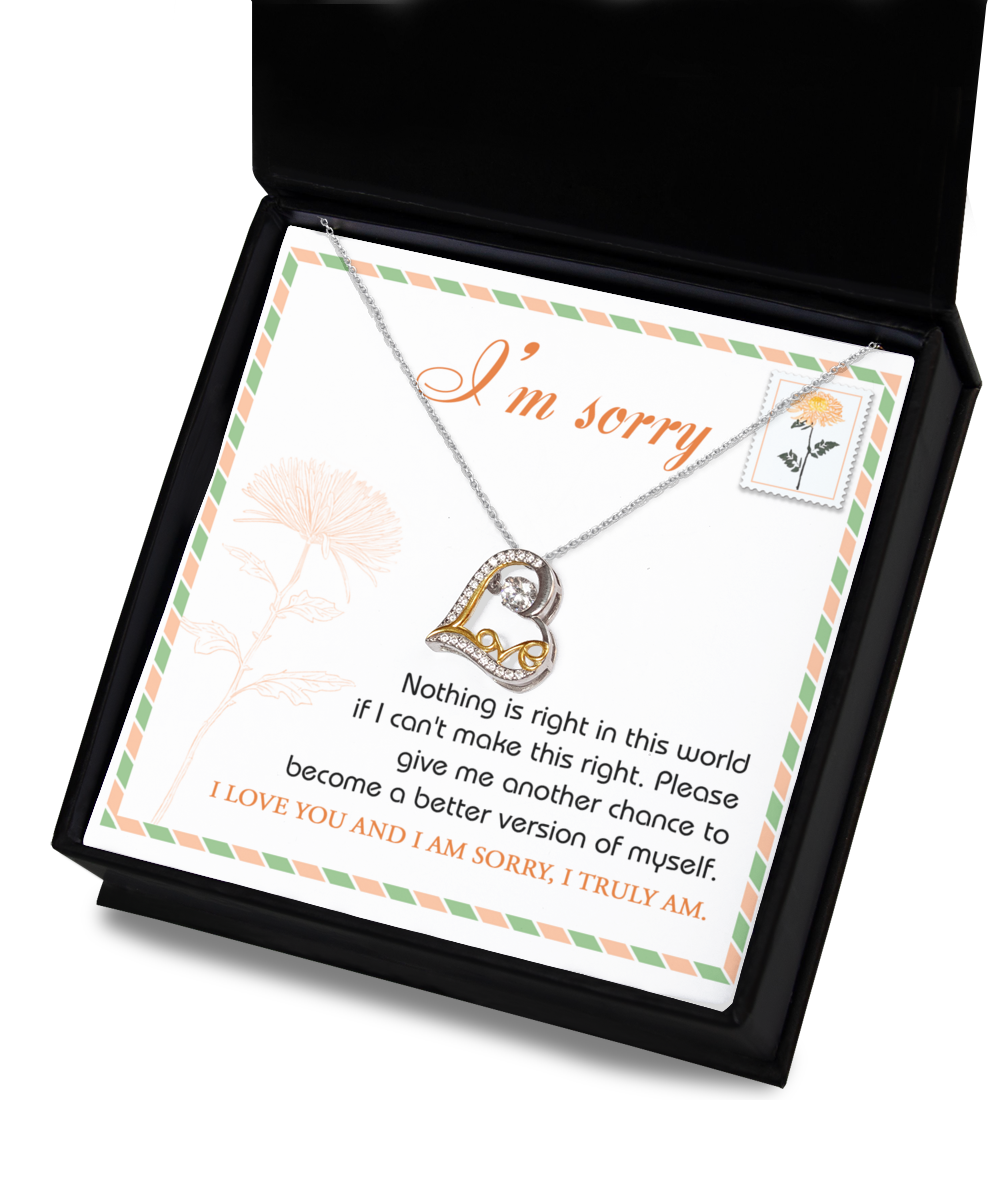 The Sorry-Another Chance - Love Dancing Necklace, featuring a heart pendant and crafted from .925 Sterling Silver, is displayed in a box that includes an apology and a heartfelt request for another chance to make things right.