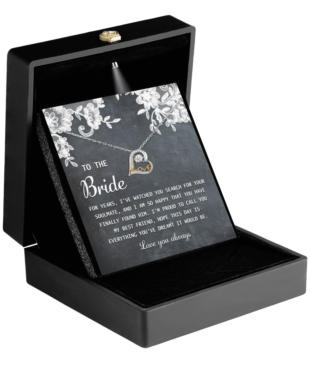 An open black jewelry box beautifully displays the elegant Love Dancing Necklace, accompanied by a card reading, "To the Bride. For years...Love you always." It's the perfect gift to cherish and adore for the bride.