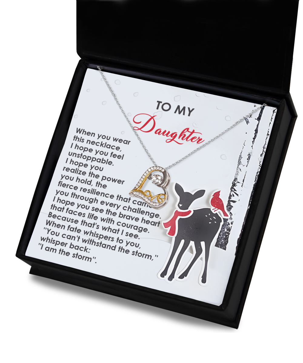 This Sterling Silver necklace, featuring a heart-shaped pendant, comes elegantly encased in a gift box. The box lid displays the words "To My Daughter," complete with a touching poem and an illustration of a deer and bird on a tree, creating the perfect Daughter-Every Challenge - Love Dancing Necklace for cherished moments.