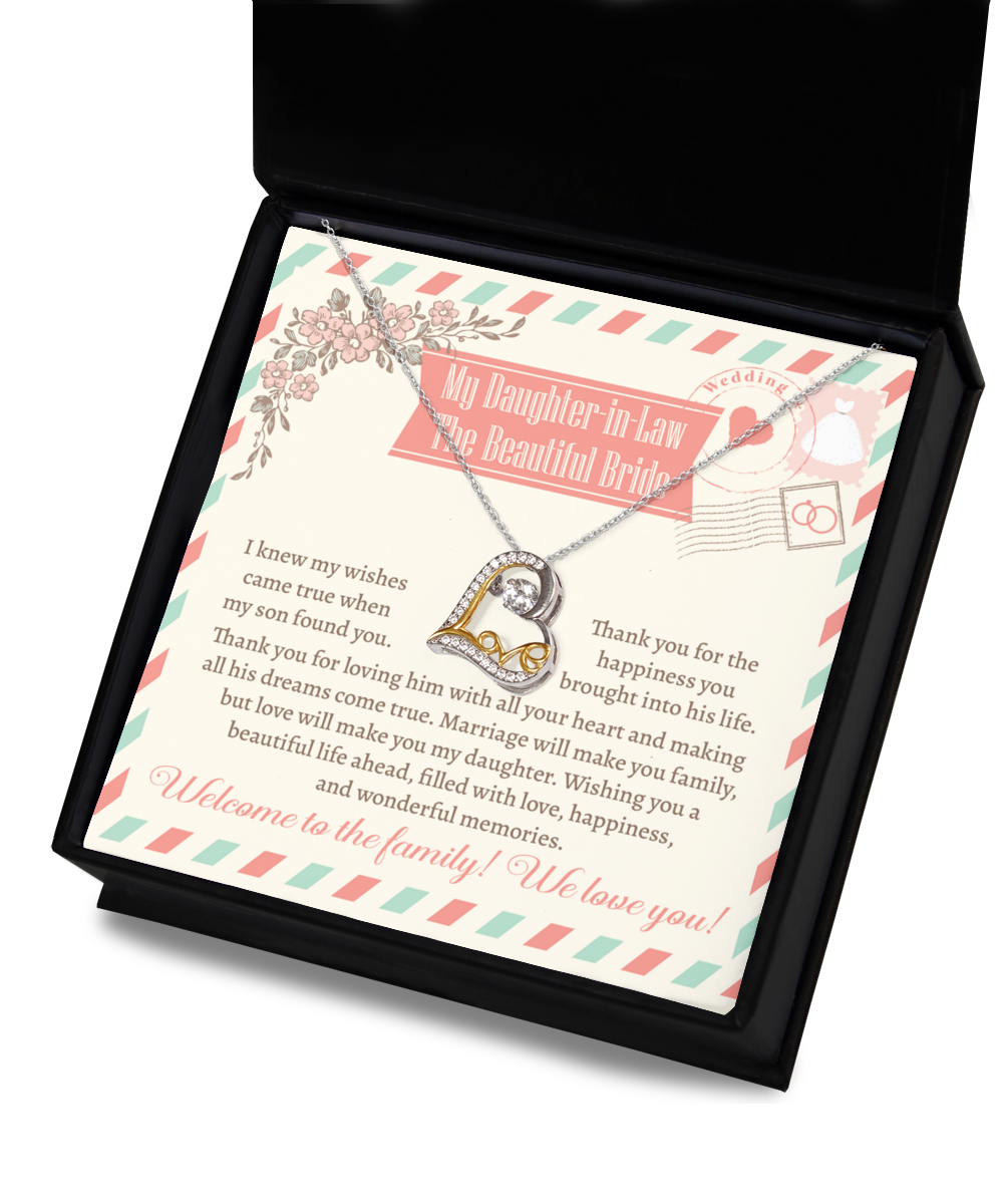 A Daughter-In-Law-Make You Family - Love Dancing Necklace in a gift box with a heartfelt message for a daughter-in-law. The message expresses love and gratitude while welcoming her to the family.