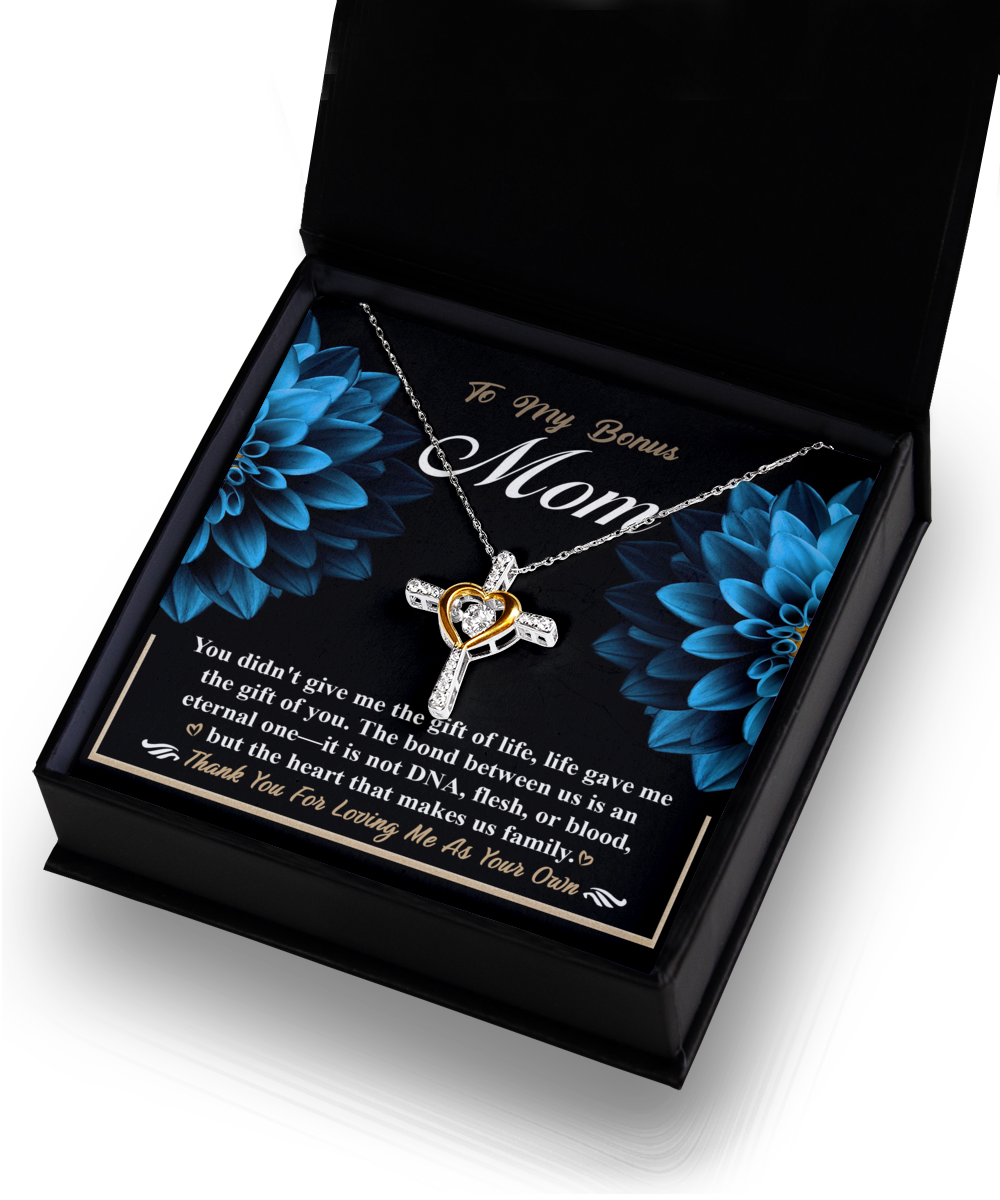 A personalized pendant necklace with a heartfelt message for mom, represented by a "Mother's Love" theme, presented in a black gift box, such as the To Bonus Mom, Gift Of You - Cross Dancing Necklace from Gearbubble.