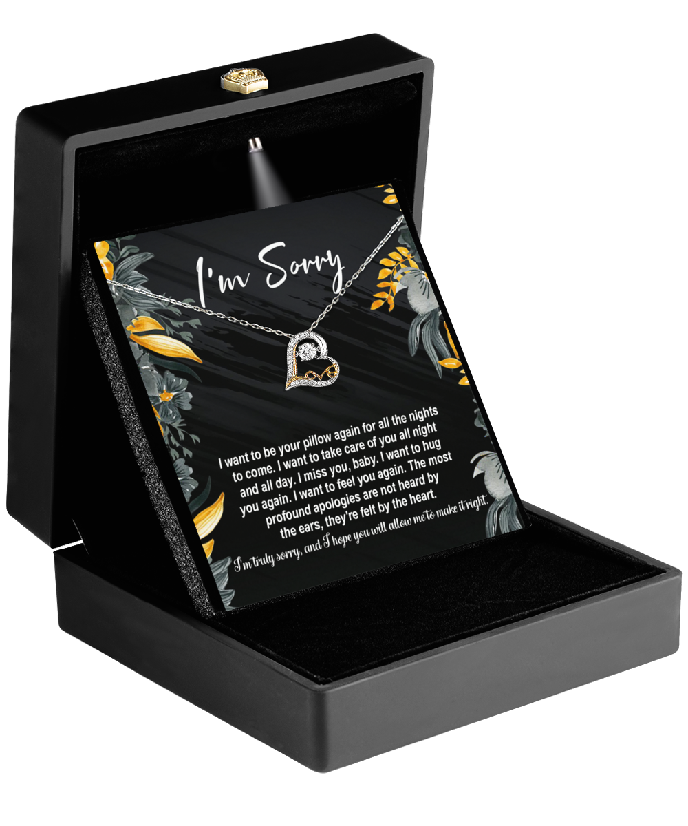 The Sorry-Be Your Pillow - Love Dancing Necklace features a heart pendant in a black box. The lid reads "I'm Sorry" with an apology message, surrounded by charming yellow and gray floral accents, capturing maternal love in this elegant 14k gold gift.