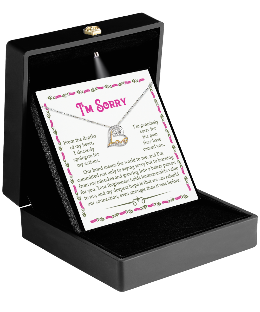 A black jewelry box with an "I'm Sorry" note and the Sorry-A Better Person - Love Dancing Necklace, featuring a .925 Sterling Silver heart pendant inside.