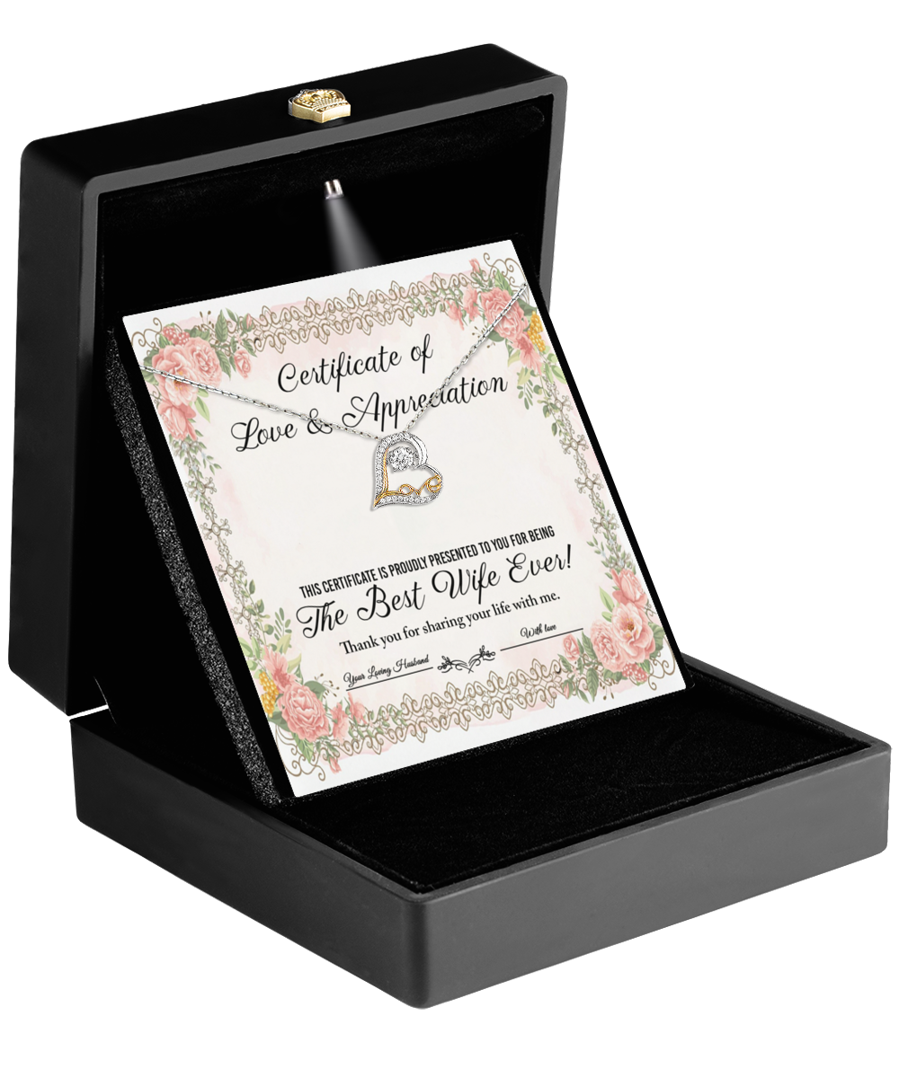 A black box featuring a "Certificate of Love & Appreciation" for the "Best Wife Ever," embellished with floral borders and a heart design, is perfectly complemented by the To Wife-Love & Appreciation - Love Dancing Necklace.