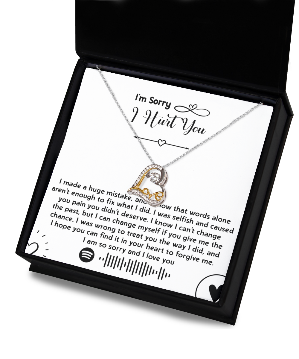 Introducing the "Sorry-You Didn't Deserve - Love Dancing Necklace," featuring a 14k gold heart-shaped pendant nestled neatly inside a box. Accompanying the necklace is an apology note expressing sincere regret and seeking forgiveness, along with a Spotify code.