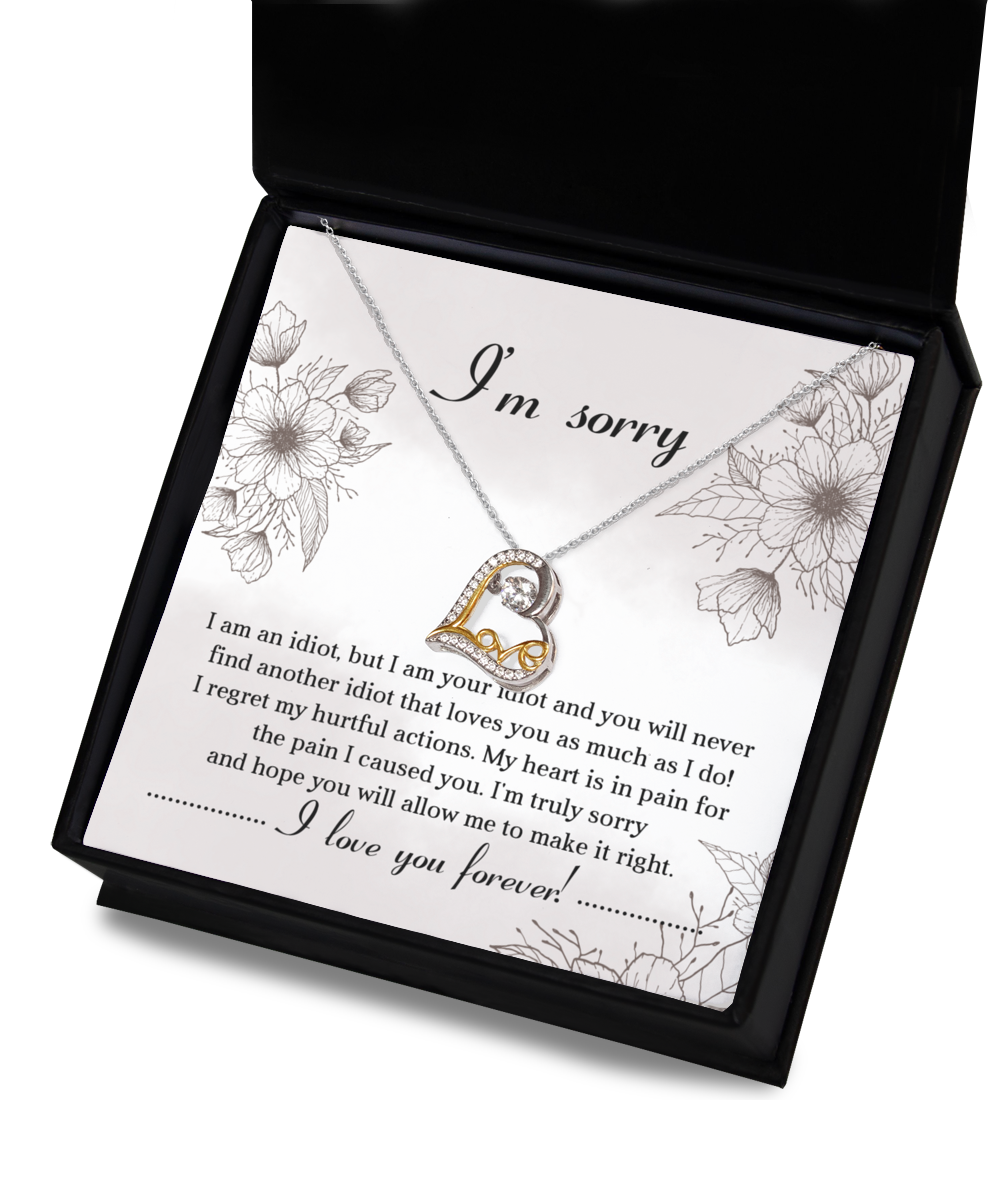 The Sorry-For The Pain - Love Dancing Necklace, a heart-shaped, 14k gold-plated piece, comes with a heartfelt apology note expressing deep regret for causing pain and pleading for forgiveness. The message concludes with "I love you forever.