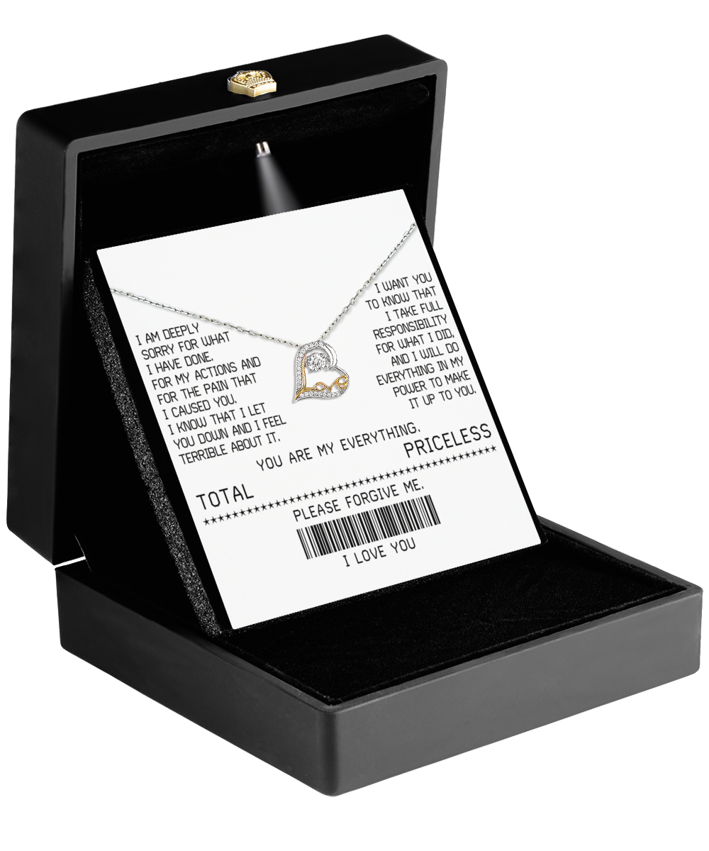 A black jewelry box displays the Sorry-Make It Up - Love Dancing Necklace, featuring interlocking hearts and 14k gold shimmer. It sits on a card expressing maternal love and an apology, with "Total: Priceless" next to a barcode.