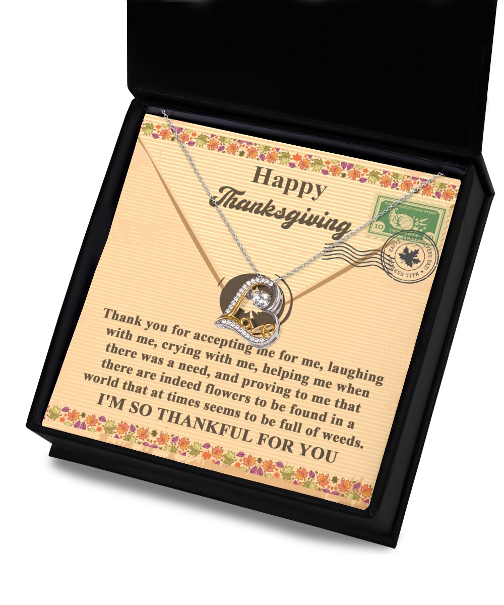 Presented in an elegant black box, the Thanksgiving-Proving To Me - Love Dancing Necklace showcases interlocking rings on a Thanksgiving-themed card. Made from 14k gold, the card carries a heartfelt message of gratitude and appreciation.