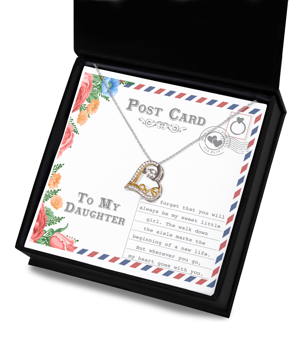 The "To Daughter-Goes With You - Love Dancing Necklace" is a Sterling Silver piece featuring a heart pendant, presented in a gift box inscribed with "To My Daughter." The background evokes the charm of a postcard, adorned with floral designs and heartfelt sentimental text.