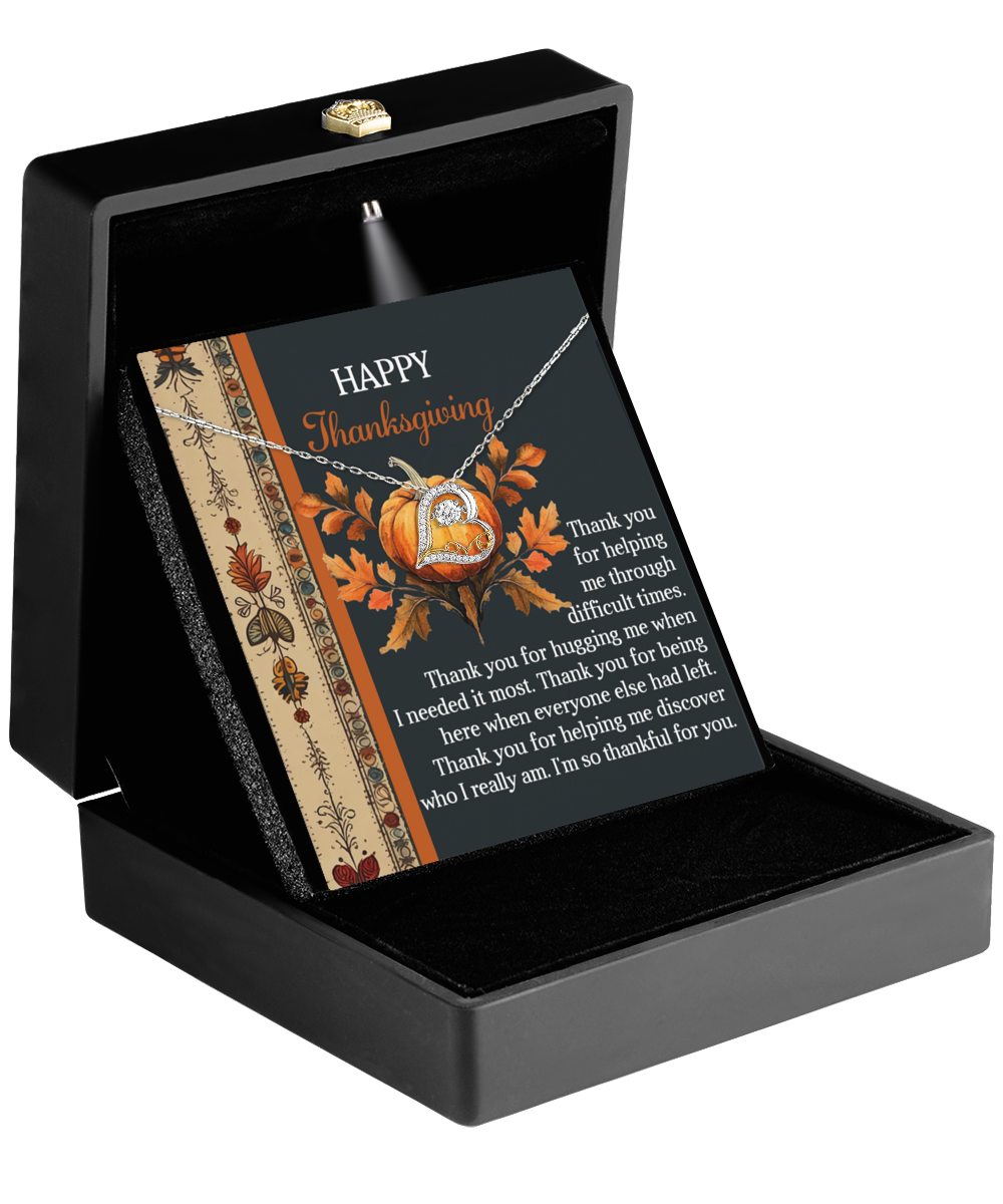 A sophisticated 14k gold necklace with a pumpkin charm, tastefully showcased inside an open black box. The lid displays an autumn-themed Thanksgiving message for the Thanksgiving-I Really Am - Love Dancing Necklace.