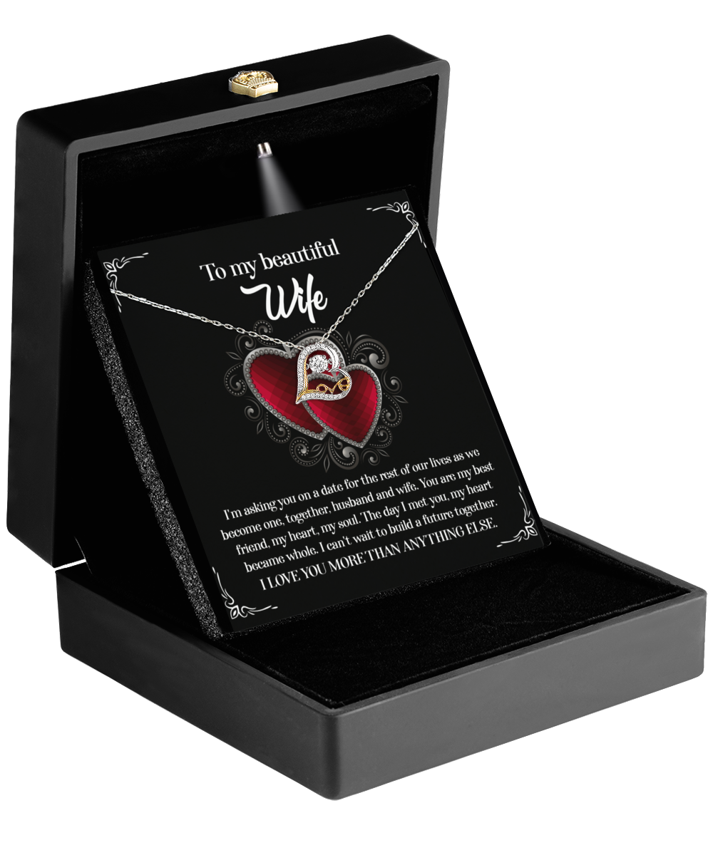 The To Wife, Heart Became Whole - Love Dancing Necklace is beautifully presented in an open black box, featuring a heart-shaped pendant paired with a heartfelt message, making it the ideal gift for your wife.