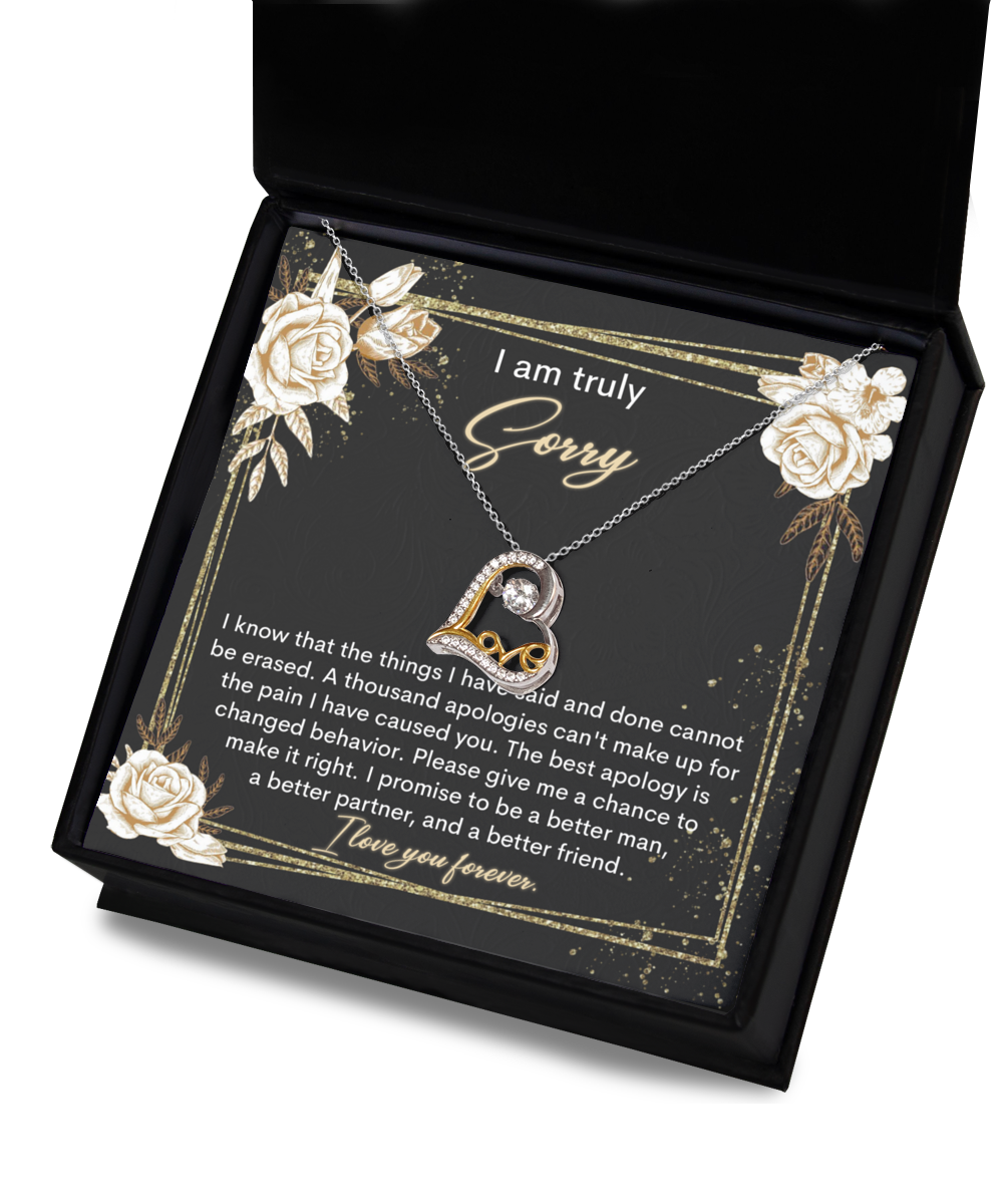 A "Sorry-Cannot Be Erased - Love Dancing Necklace" comes in a box with an apology note that reads, "I am truly sorry. I promise to be a better man, a better partner, and a better friend. I love you forever.