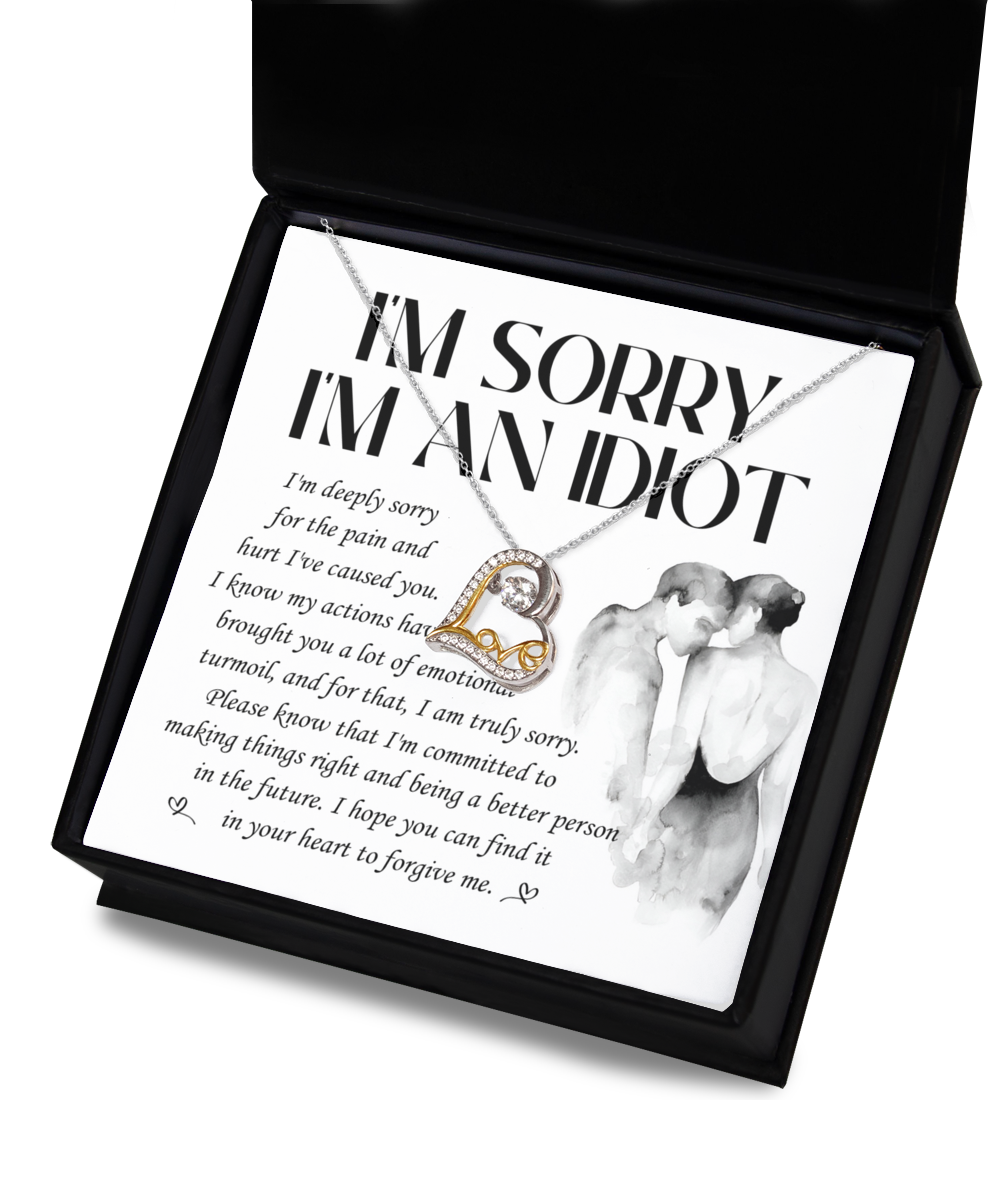 The "Sorry-Emotional Turmoil - Love Dancing Necklace," a .925 Sterling Silver necklace featuring a heart-shaped pendant, is showcased above a note that reads, "I'm Sorry I'm An Idiot," alongside an apology message expressing regret and seeking forgiveness.