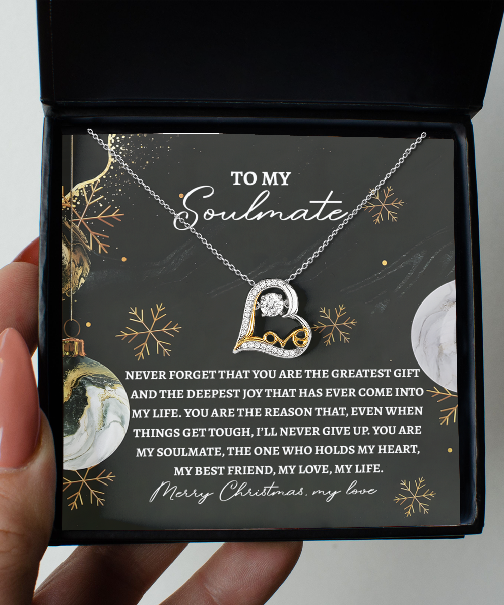 Introducing the Soulmate-Greatest Gift - Love Dancing Necklace, this exquisite piece features a sterling silver heart-shaped pendant, elegantly presented in a box with a card that reads "To My Soulmate" along with a heartfelt message.