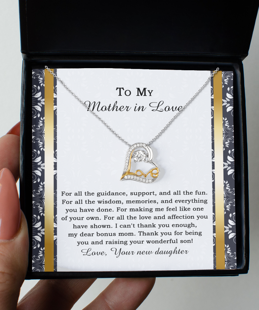 The "To Mother-in-law-Of Your Own - Love Dancing Necklace" comes beautifully packaged in a box with an intricate background and a heartfelt message of gratitude. Expertly crafted in stunning 14k gold, this exquisite piece is designed to show just how much you care for your mother-in-law.