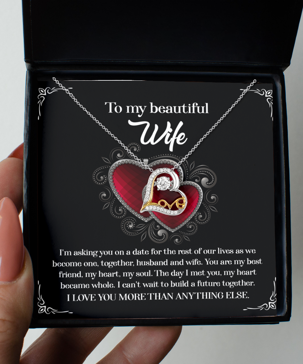 A To Wife, Heart Became Whole - Love Dancing Necklace in .925 Sterling Silver, displayed in a black box with a message to a wife expressing love and future commitment.