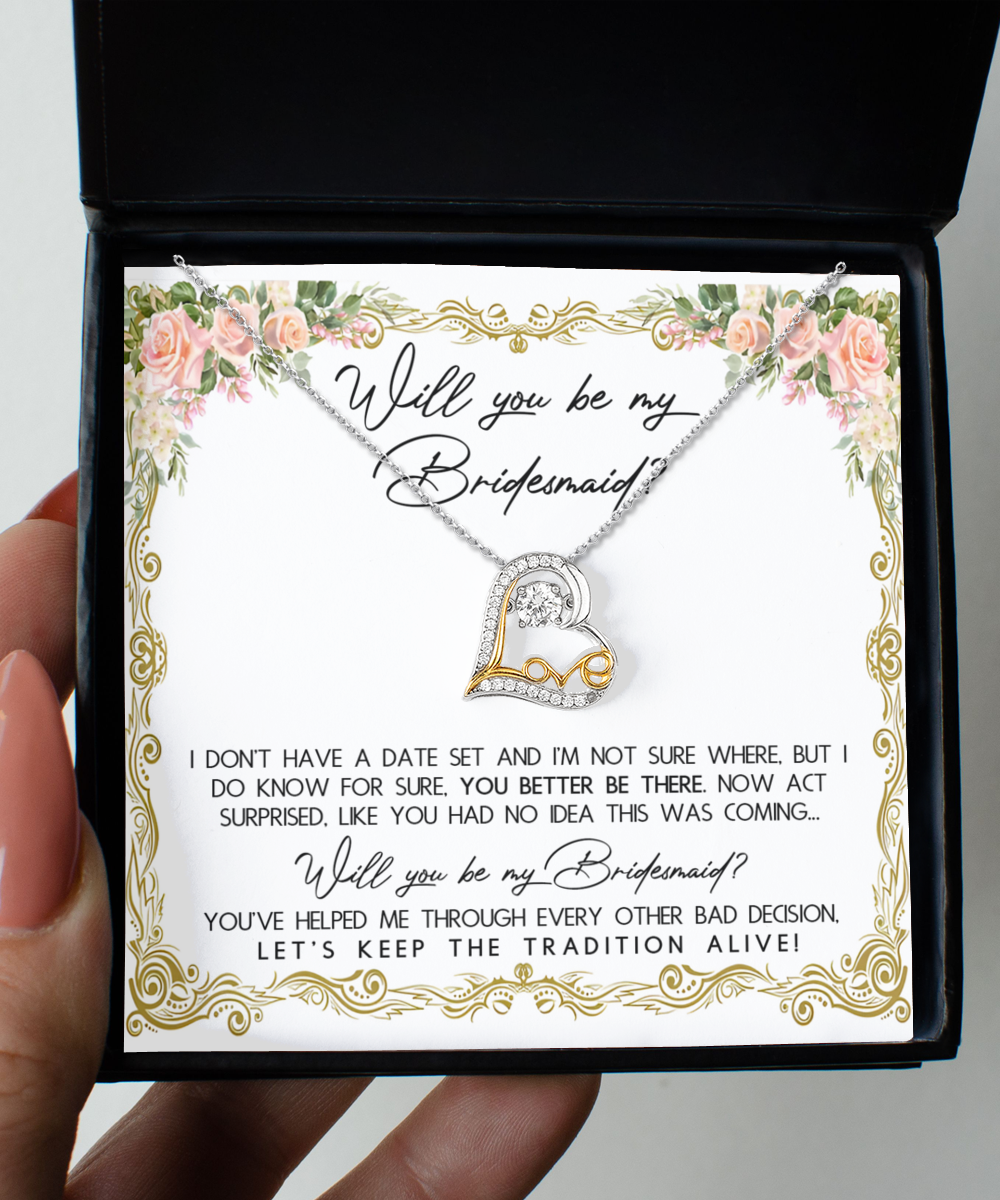 Elegant Bridesmaid-Keep The Tradition - Love Dancing Necklace with a heart pendant set against a floral card with the message, "Will you be my Bridesmaid?" in decorative text. The card humorously asks the recipient to join in on your special day.