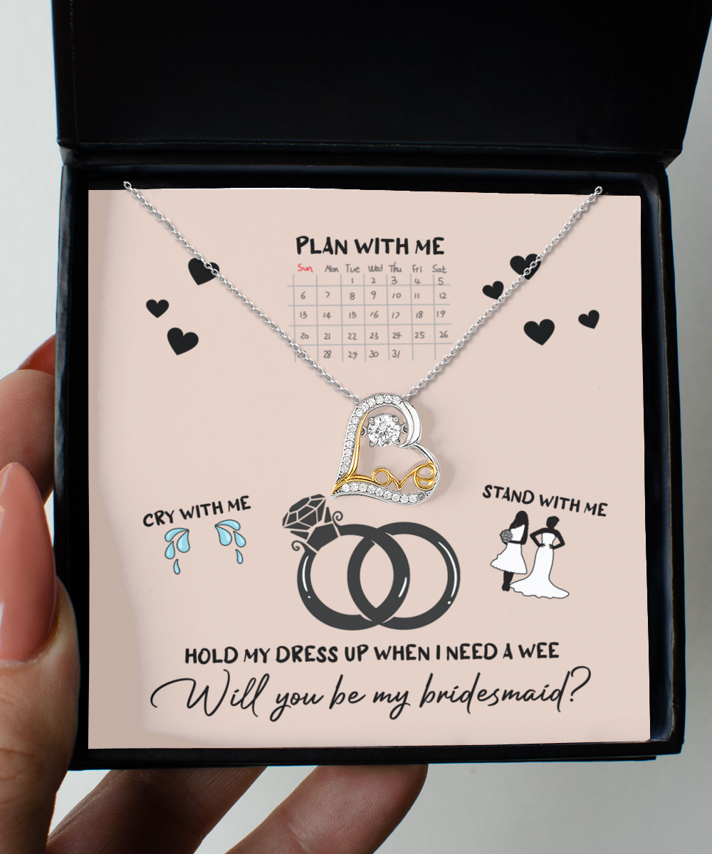 A Bridesmaid-Will You Be 2 - Love Dancing Necklace, crafted from .925 Sterling Silver, is elegantly displayed against a backdrop featuring a bridesmaid proposal calendar and various charming illustrations including wedding rings and bridesmaids.