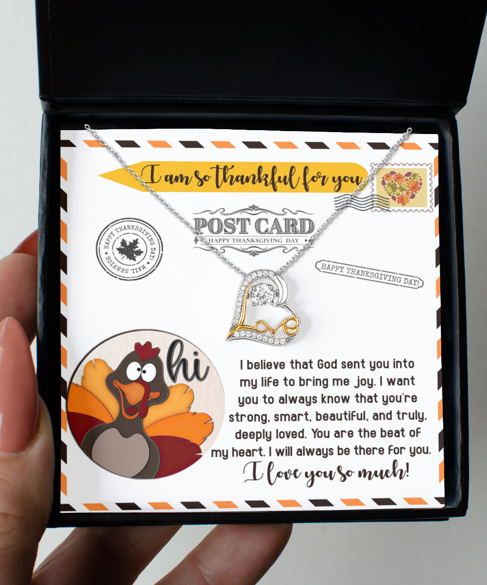 A gift box featuring the "Thanksgiving-The Beat - Love Dancing Necklace" and a Thanksgiving-themed card with a cartoon turkey and heartfelt message.