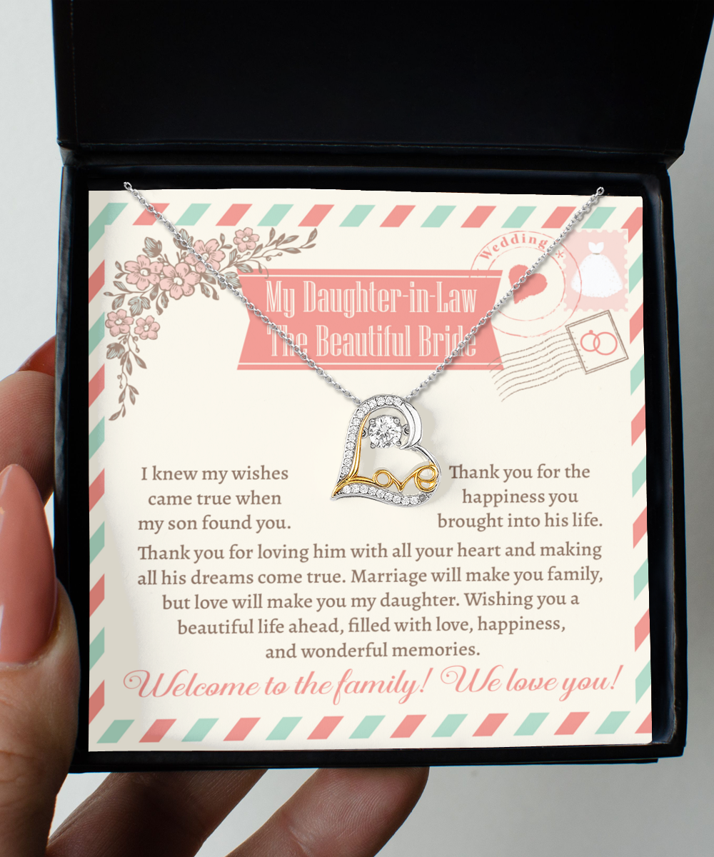 A Daughter-In-Law-Make You Family - Love Dancing Necklace in a gift box with a heartfelt message for a daughter-in-law. The message expresses love and gratitude while welcoming her to the family.