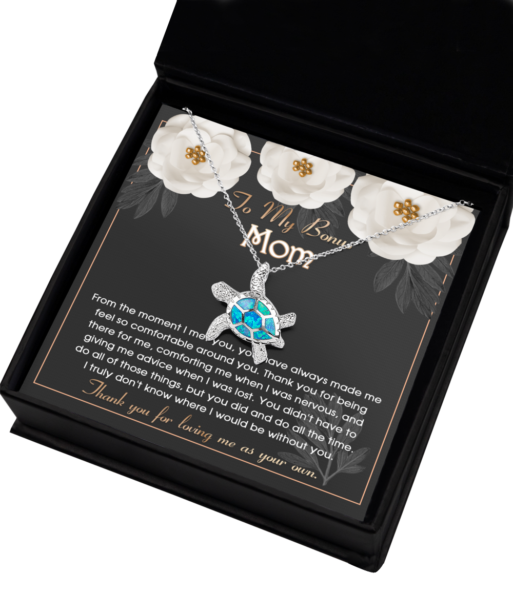 A To Bonus Mom, All The Time Opal Turtle Necklace by Gearbubble, a heartfelt symbol of love for a Bonus Mom, presented in a jewelry box.